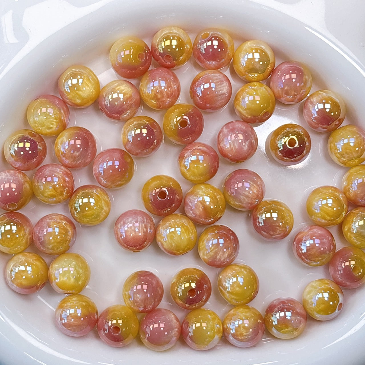 シラーミラージュシリーズ No.6イエロー×ピンク 光学ビーズ 16㎜