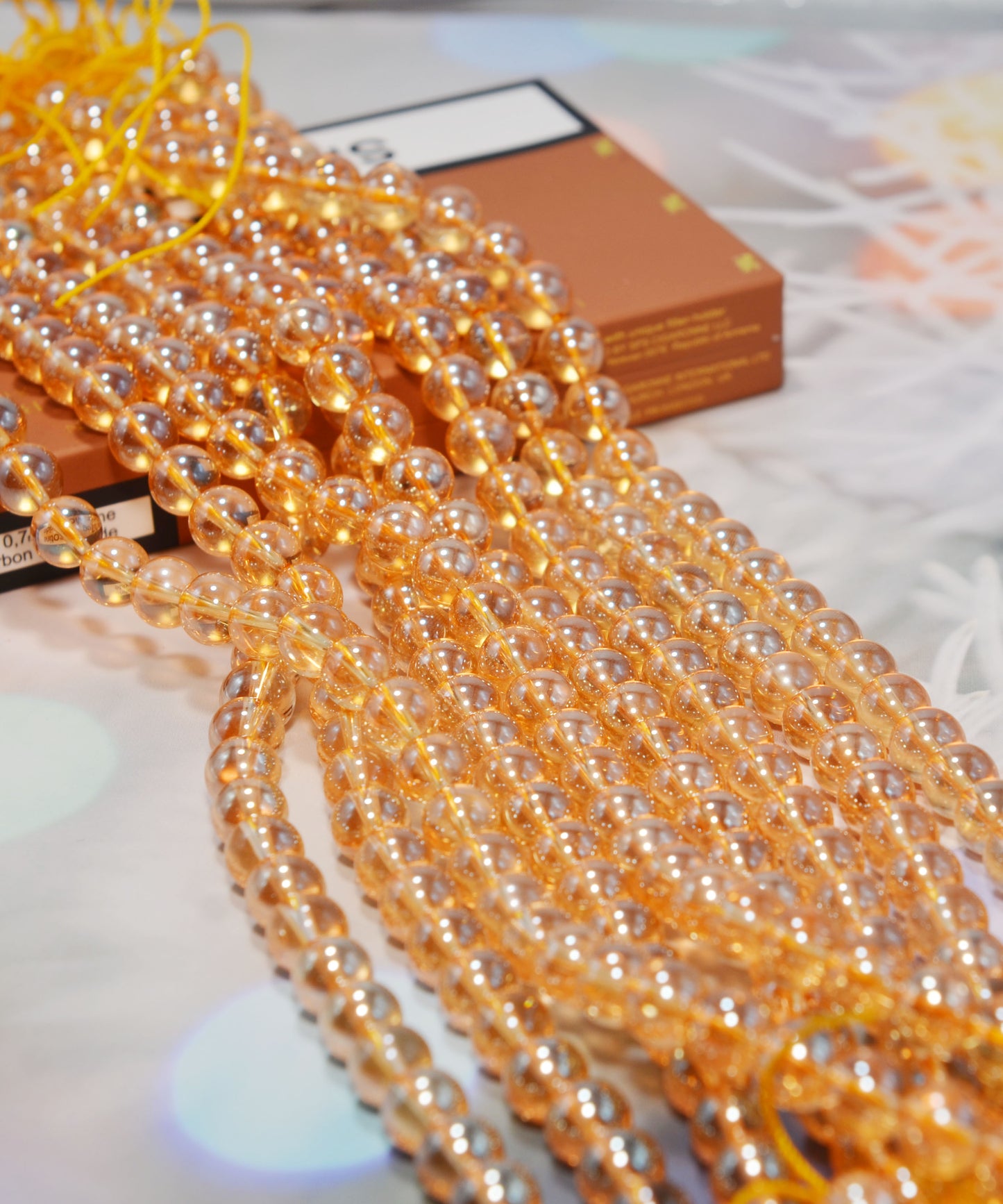 天然水晶ビーズ オーロラメッキ加工 オレンジ系 8㎜ (1連)