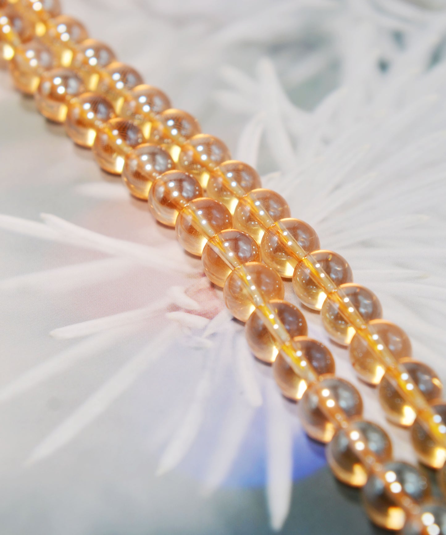 天然水晶ビーズ オーロラメッキ加工 オレンジ系 8㎜ (1連)
