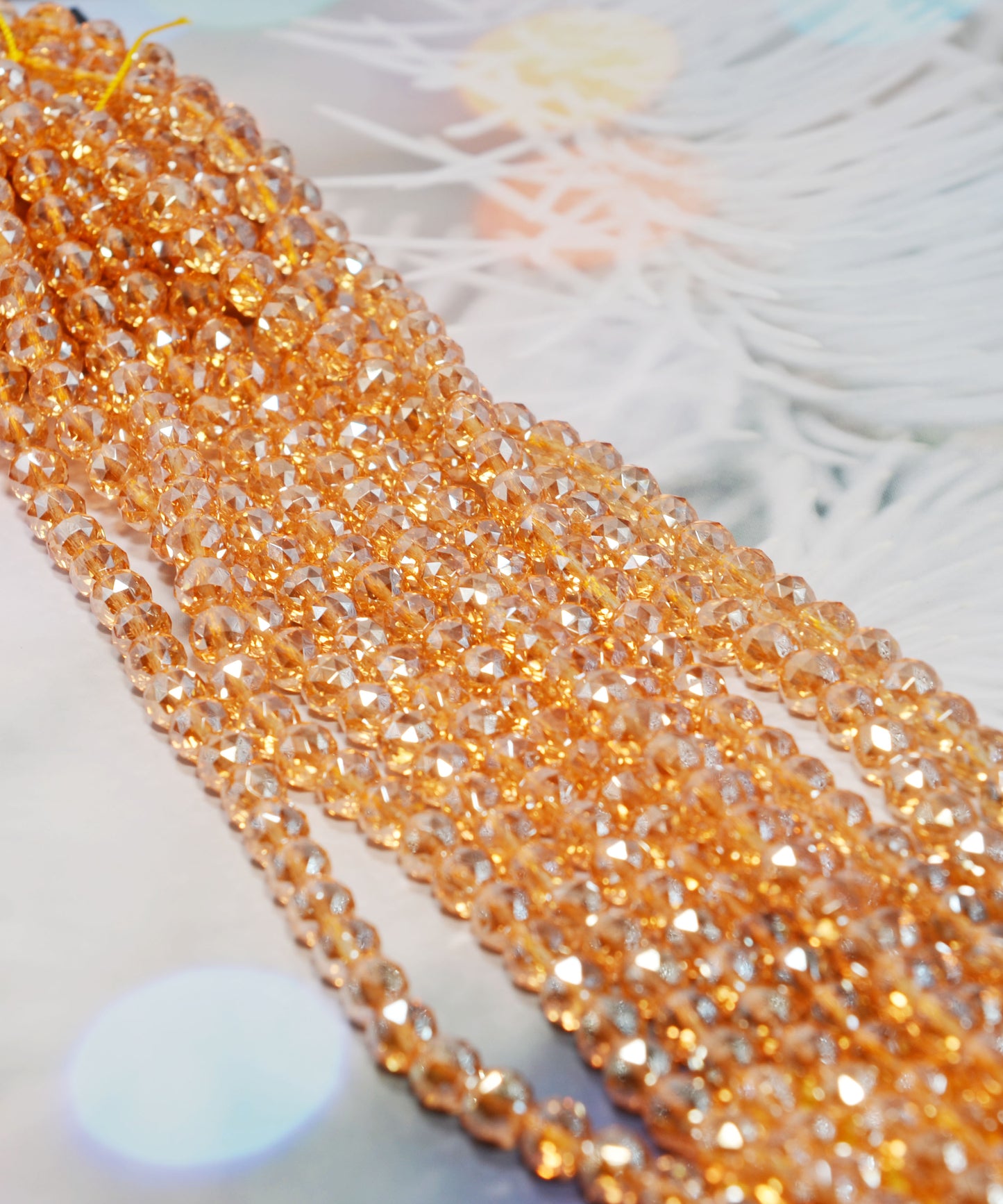 天然水晶ビーズ  多面カット オーロラメッキ加工 オレンジ系 8㎜ (1連)